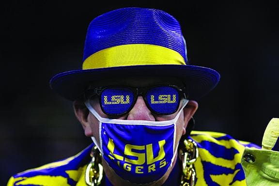 An LSU fan looks on at the Texas Bowl.